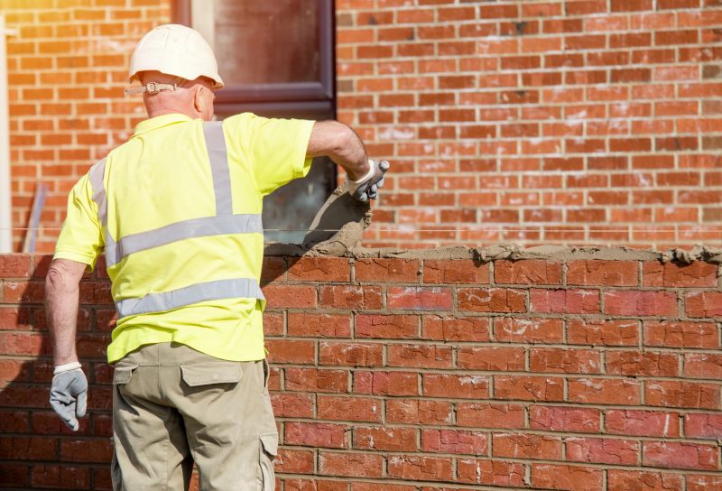 Expert Mason Installing Brickwork